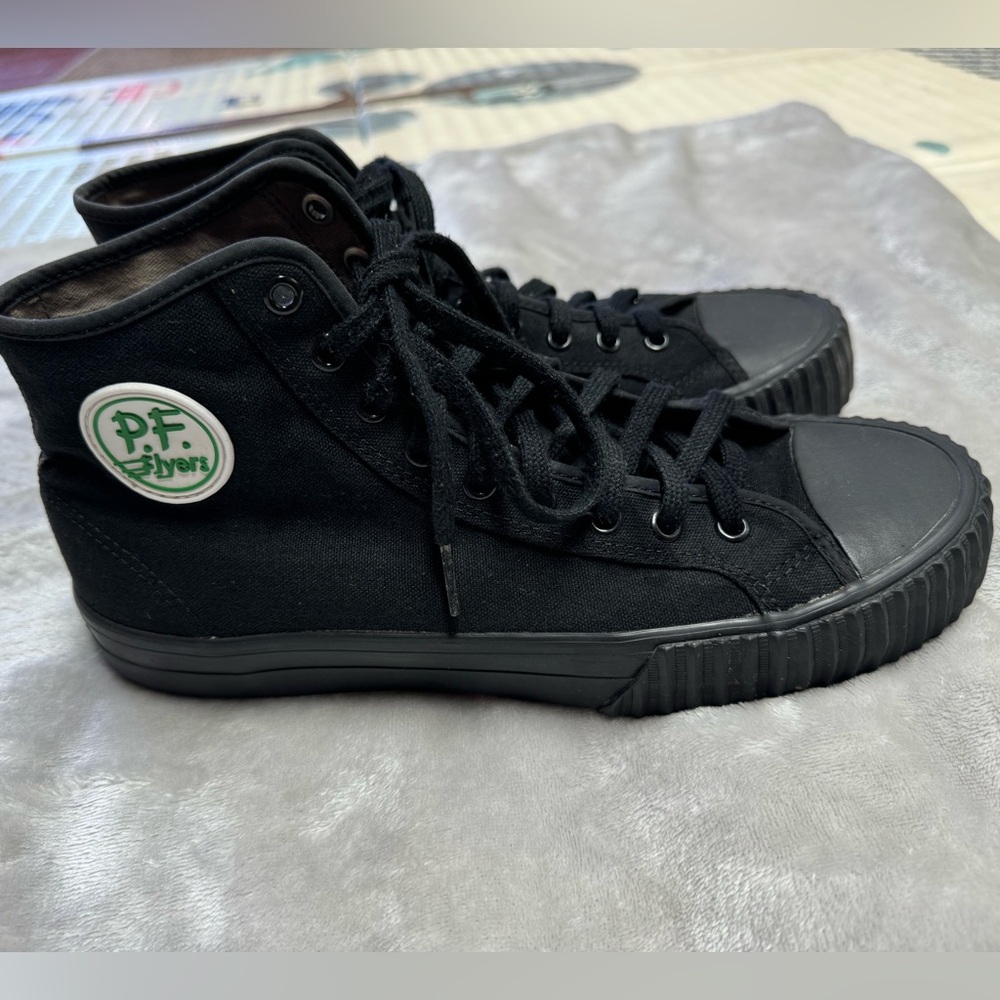 Men’s black PF Flyers